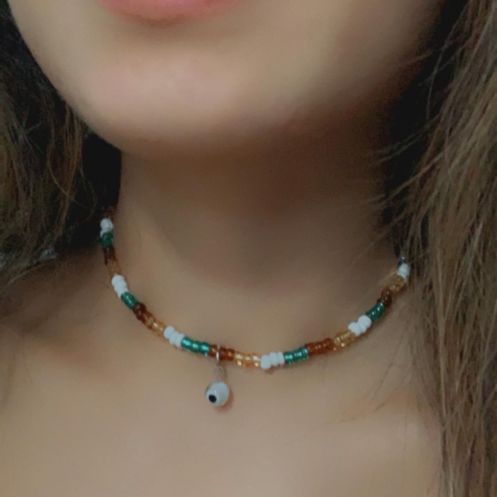 Hand made Beaded choker with evil eye charm